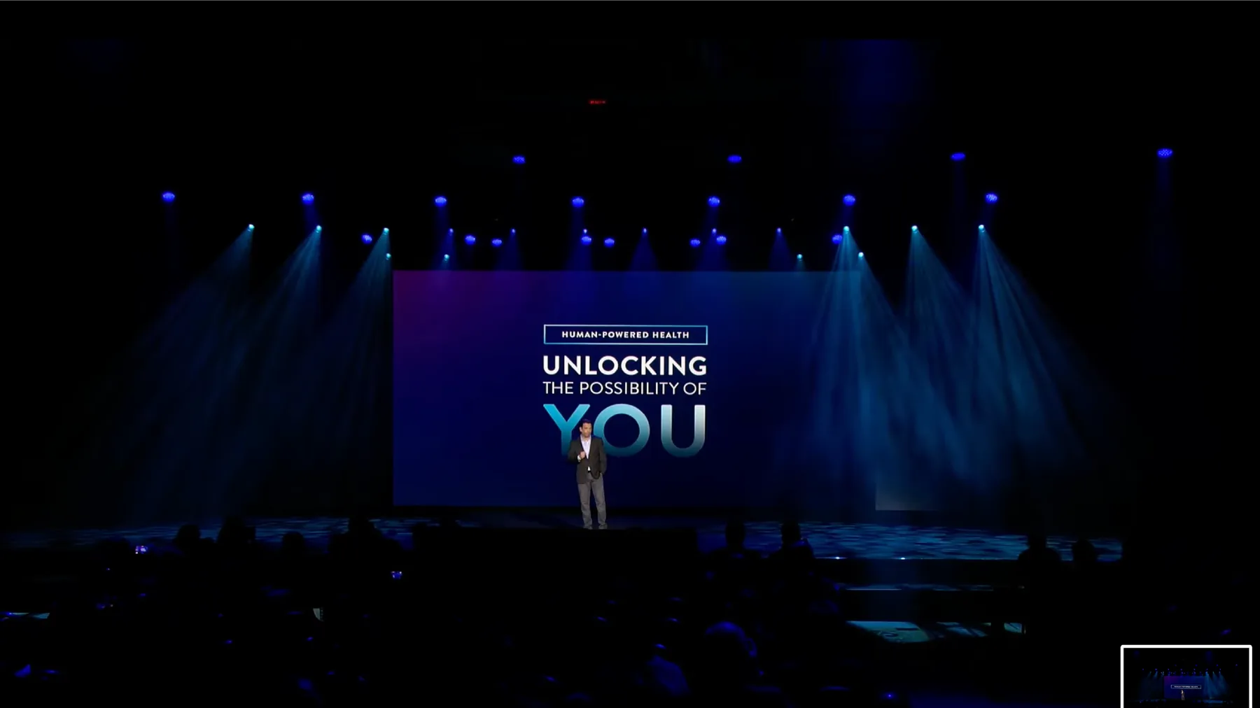 Abbott live keynote stage showing Unlocking the Possibility of You