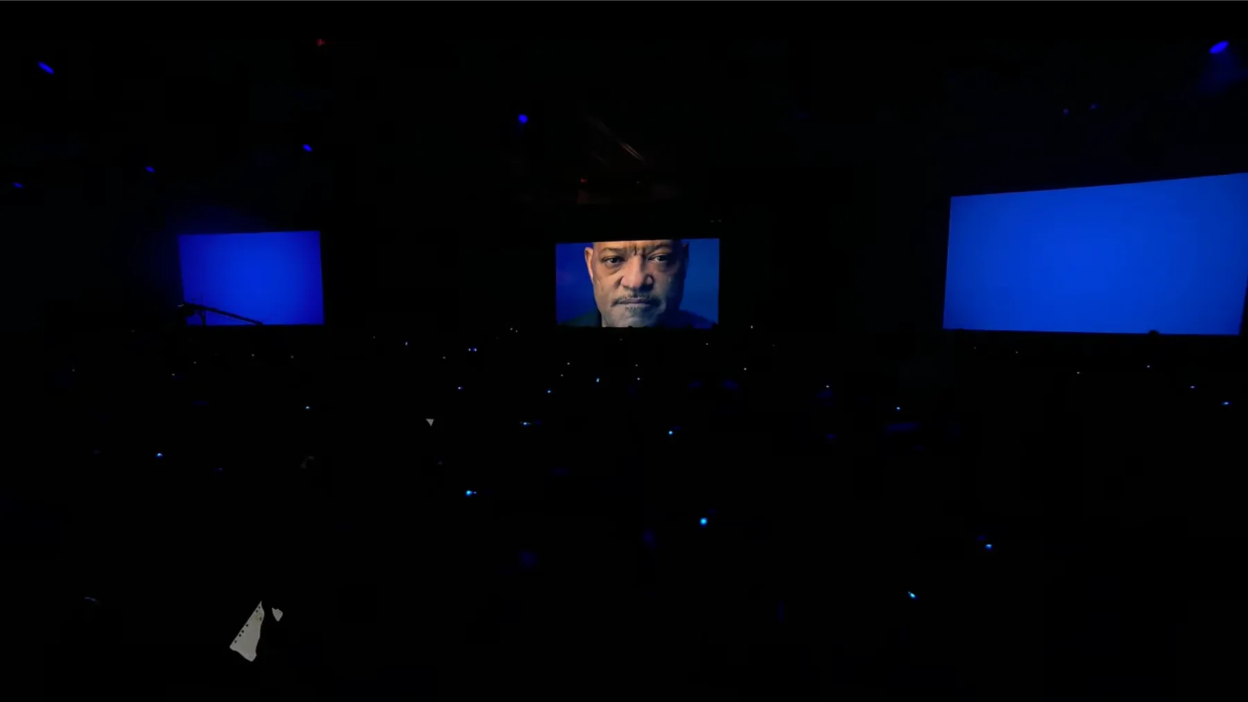 Abbott keynote dark stage screen with Laurence Fishburne voiceover moment